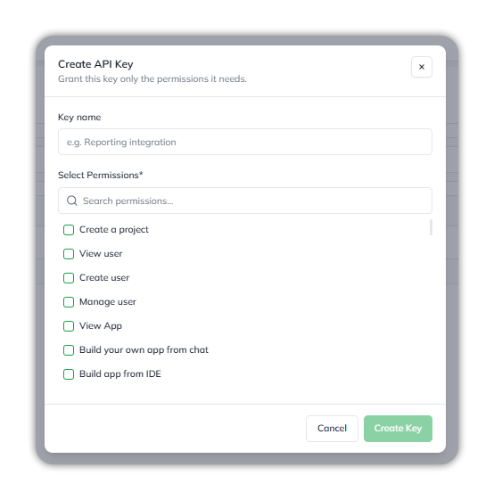 The Create API Key dialog: a Key name field with the placeholder e.g. Reporting integration, a Select Permissions list with a Search permissions field and checkboxes such as Create a project, View user, Create user, Manage user, View App, Build your own app from chat and Build app from IDE, and Cancel and Create Key buttons